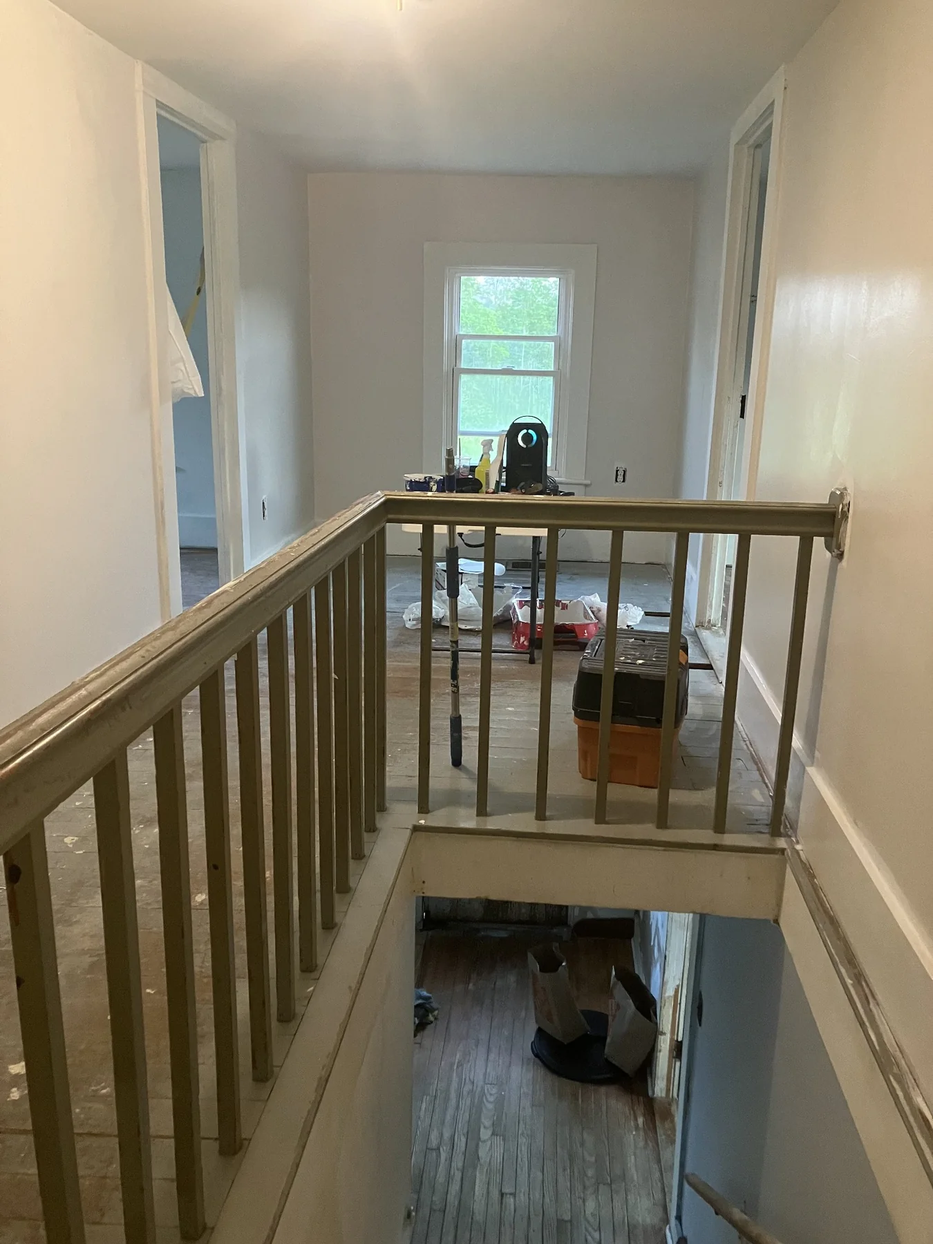Stair railing and floor before